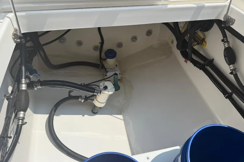  Yacht Photos Pics 2018 Regulator 31 boat interior showing plumbing and wiring components.