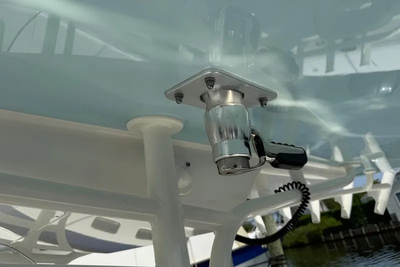  Yacht Photos Pics Close-up of a 2018 Regulator 31 boat's metal fixture under a blue canopy.