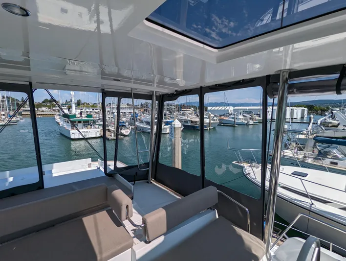 Neve Yacht Photos Pics Luxurious Bali 4.6 catamaran interior with marina view, 2022 model.