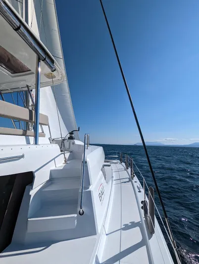 Neve Yacht Photos Pics Sailing on a 2022 Bali 4.6 catamaran under clear blue skies.