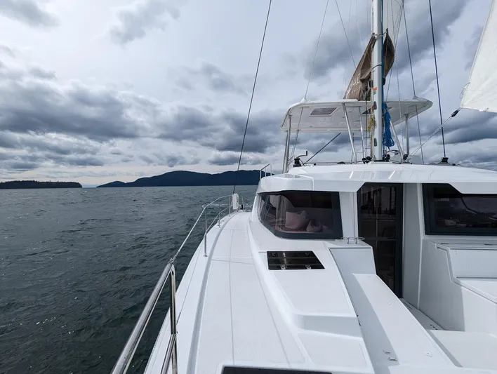 Neve Yacht Photos Pics Sailing on a 2022 Bali 4.6 catamaran under cloudy skies.