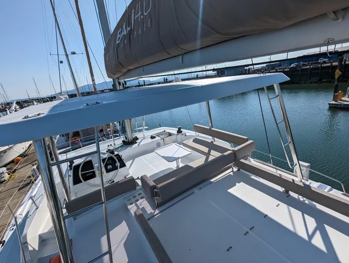 Neve Yacht Photos Pics Sailing catamaran Bali 4.6, 2022 model, docked at marina with spacious deck.