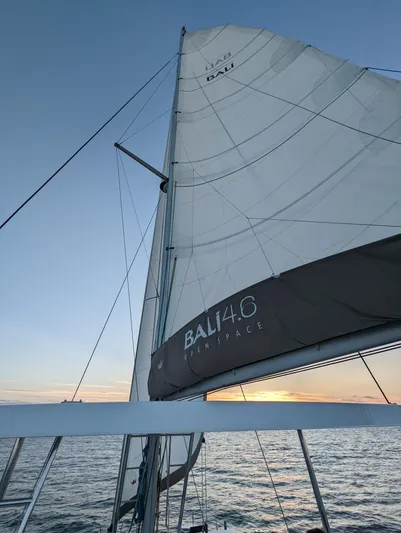 Neve Yacht Photos Pics Sailing yacht Bali 4.6 at sunset, 2022 model, on open sea.