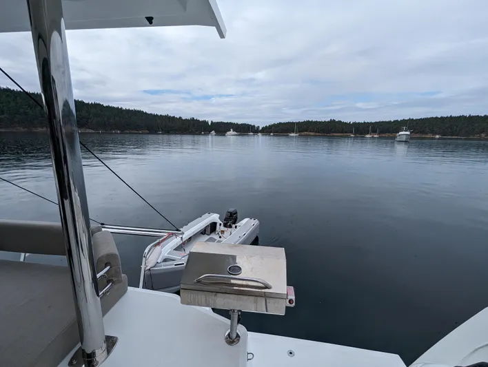 Neve Yacht Photos Pics Bali 4.6 yacht on calm water with scenic forested shoreline, 2022 model.