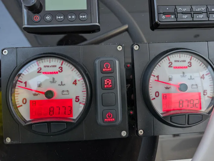 Neve Yacht Photos Pics Close-up of Bali 4.6 yacht's dual engine gauges, displaying RPM and engine hours.