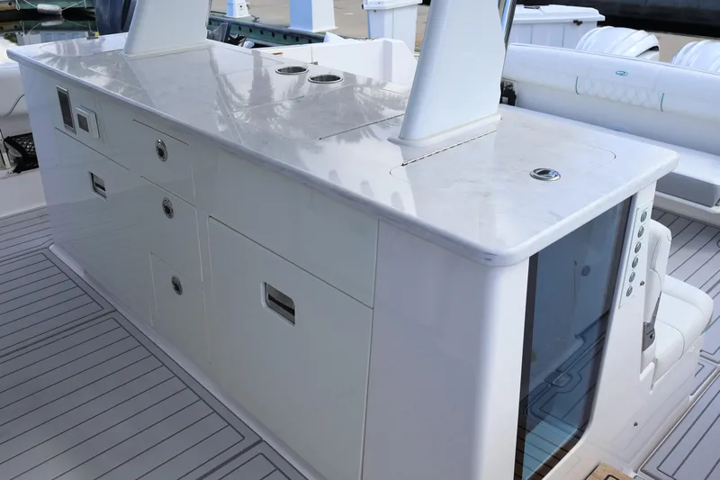  Yacht Photos Pics 2022 Regal 38 SAV boat interior with sleek white cabinetry and modern design.