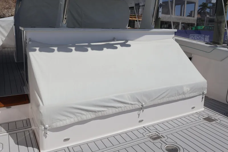  Yacht Photos Pics 2022 Regal 38 SAV boat deck with covered seating area.