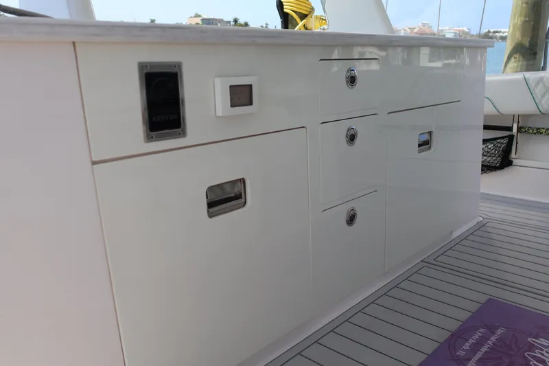  Yacht Photos Pics 2022 Regal 38 SAV boat interior with sleek white cabinetry and modern design.