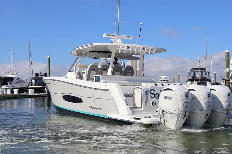  Yacht Photos Pics 2022 Regal 38 SAV boat with Yamaha engines docked at marina.