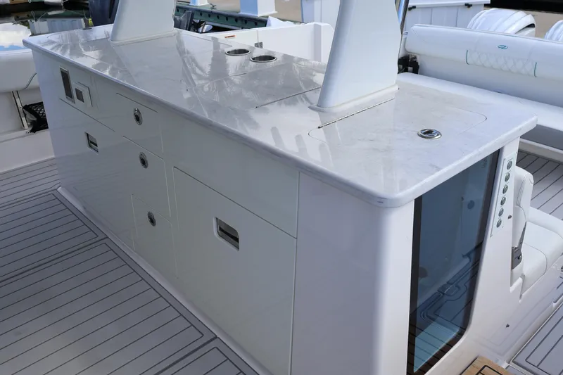  Yacht Photos Pics 2022 Regal 38 SAV boat interior with sleek white cabinetry and modern design.