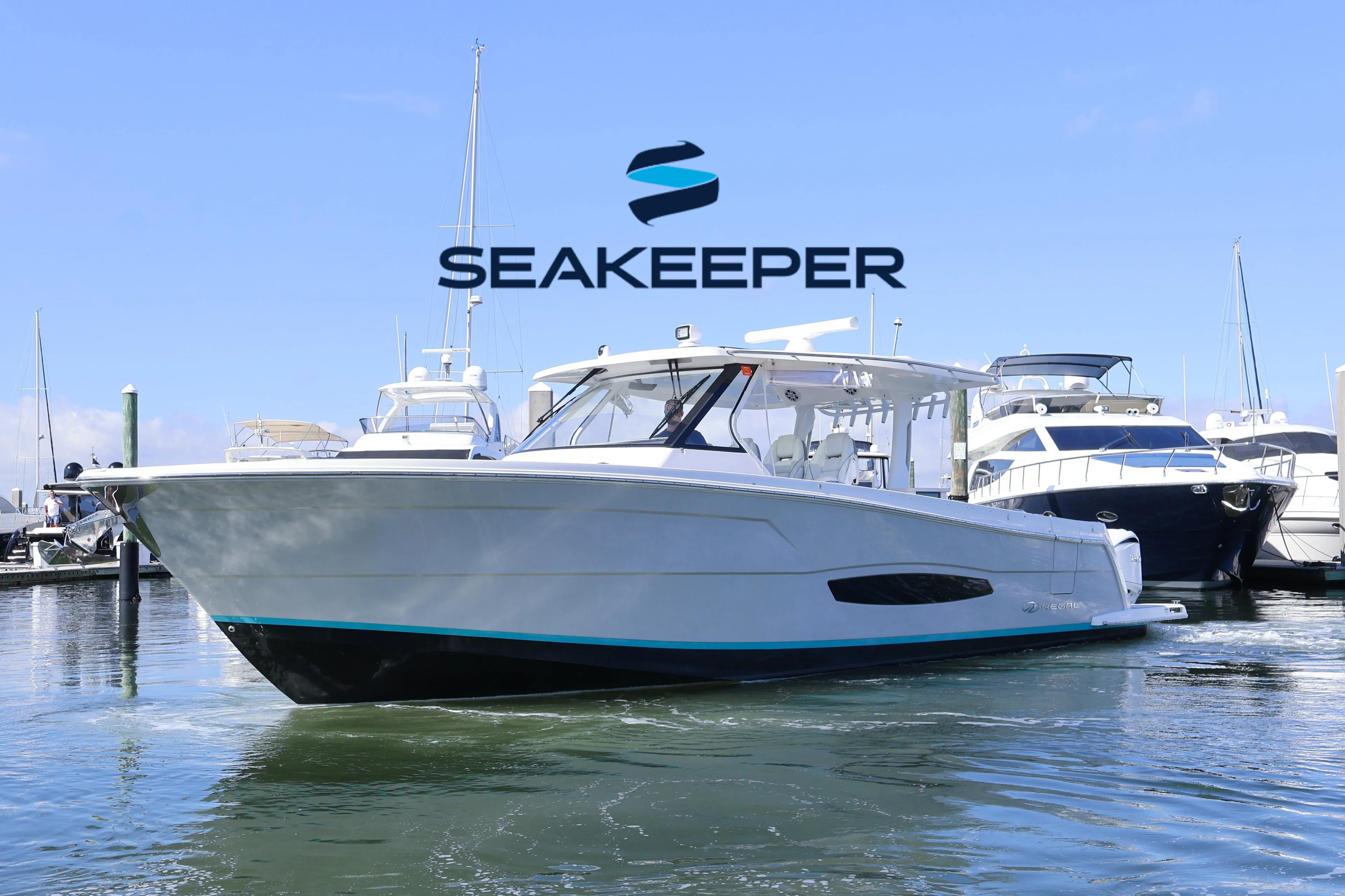 2022 Regal 38 SAV boat docked, featuring Seakeeper stabilization technology.