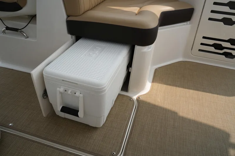  Yacht Photos Pics 2023 Sea Ray SLX 310 interior with built-in cooler under seat.