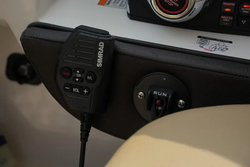  Yacht Photos Pics Simrad radio control on 2023 Sea Ray SLX 310 boat dashboard.