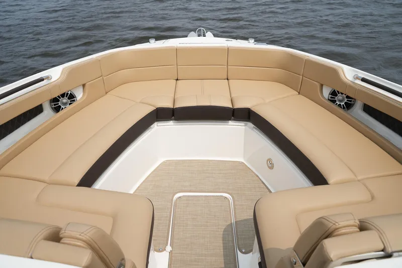  Yacht Photos Pics 2023 Sea Ray SLX 310 boat with luxurious tan seating and spacious deck.