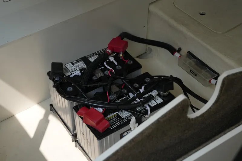  Yacht Photos Pics Batteries in a 2023 Sea Ray SLX 310 boat, showing wiring and connections.