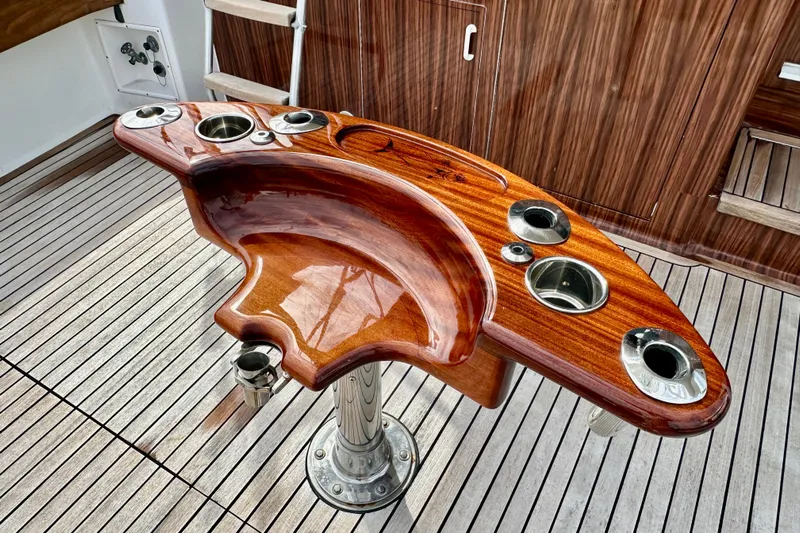 Dock Fee Yacht Photos Pics Polished wooden fishing station on 1998 Viking 50 Convertible yacht deck.