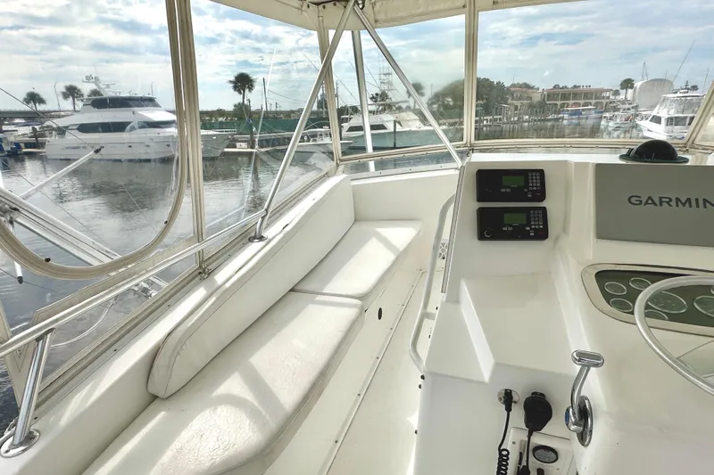 Dock Fee Yacht Photos Pics Interior view of 1998 Viking 50 Convertible yacht with Garmin navigation system.