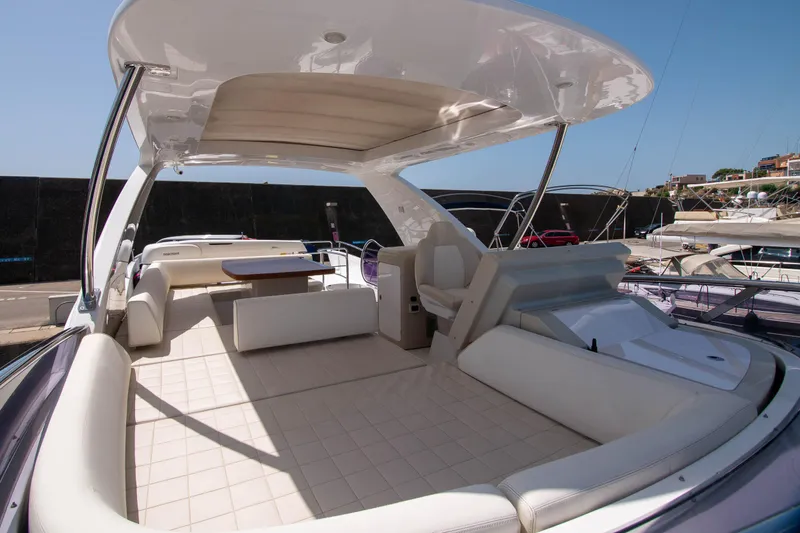 Elena Yacht Photos Pics Luxurious 2013 Azimut 64 yacht with spacious deck and elegant seating area.