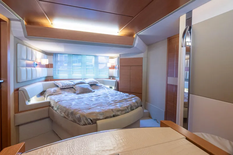 Elena Yacht Photos Pics Luxurious bedroom interior of 2013 Azimut 64 yacht with modern design and cozy bedding.