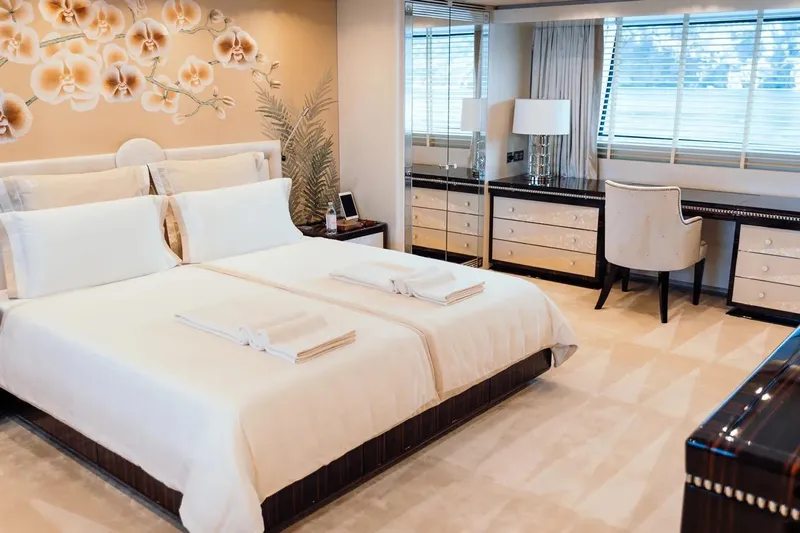  Yacht Photos Pics Luxurious bedroom on San Lorenzo 52Steel yacht, featuring elegant decor and plush bedding.