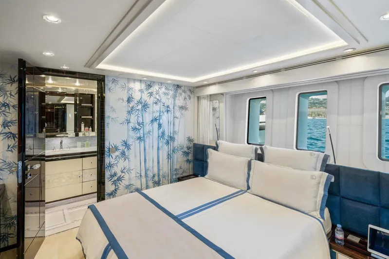  Yacht Photos Pics Luxurious bedroom on 2018 Sanlorenzo 52Steel yacht with elegant decor and ocean view.