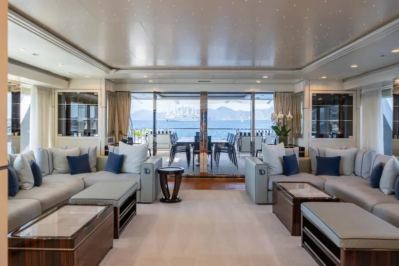  Yacht Photos Pics Luxurious interior of 2018 Sanlorenzo 52Steel yacht with elegant seating and ocean view.