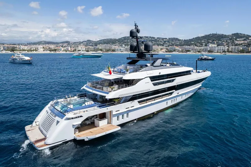  Yacht Photos Pics Luxurious 2018 Sanlorenzo 52Steel yacht cruising in scenic coastal waters.