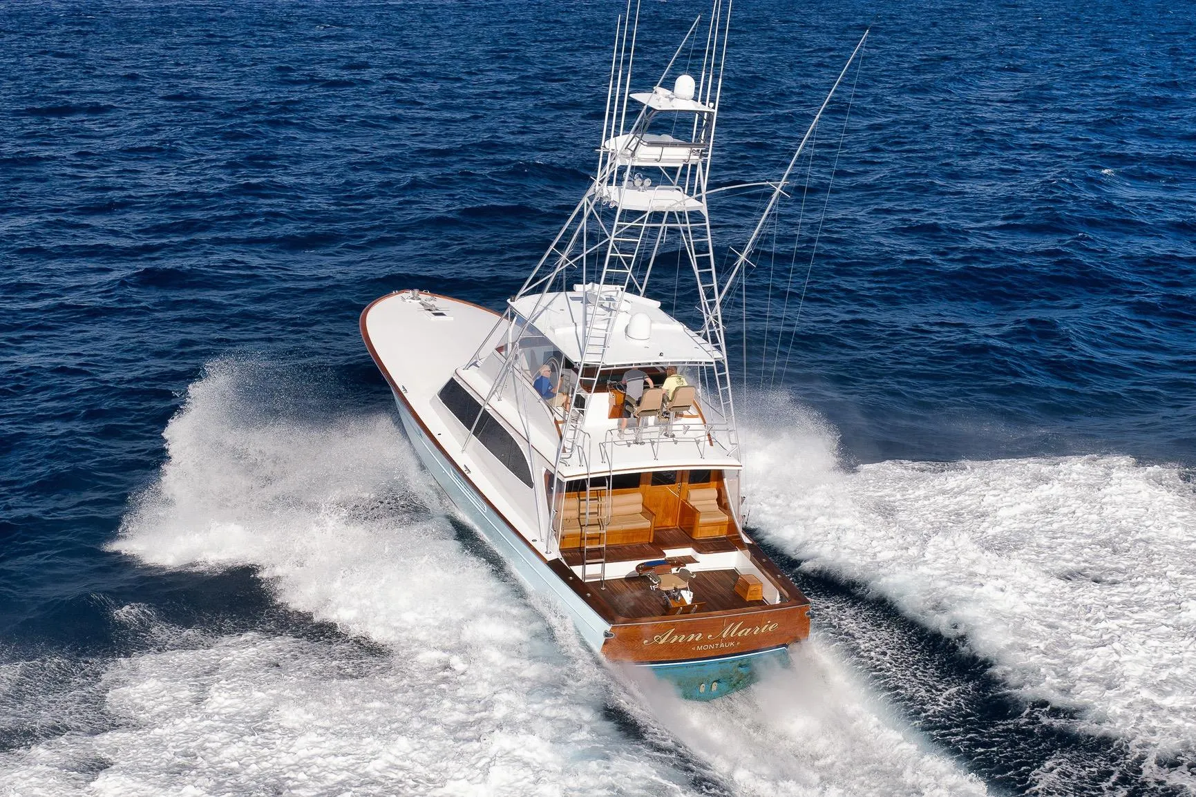 1993 Merritt Sportfish yacht cruising on open ocean waters.