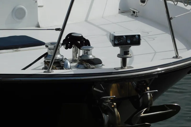 Liquid Gold Yacht Photos Pics Bow of 2001 Jefferson Pilothouse 57 yacht with winches and navigation equipment.