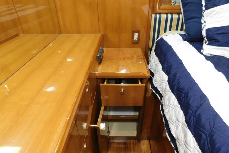 Liquid Gold Yacht Photos Pics Side of Queen bed in Master Stateroom