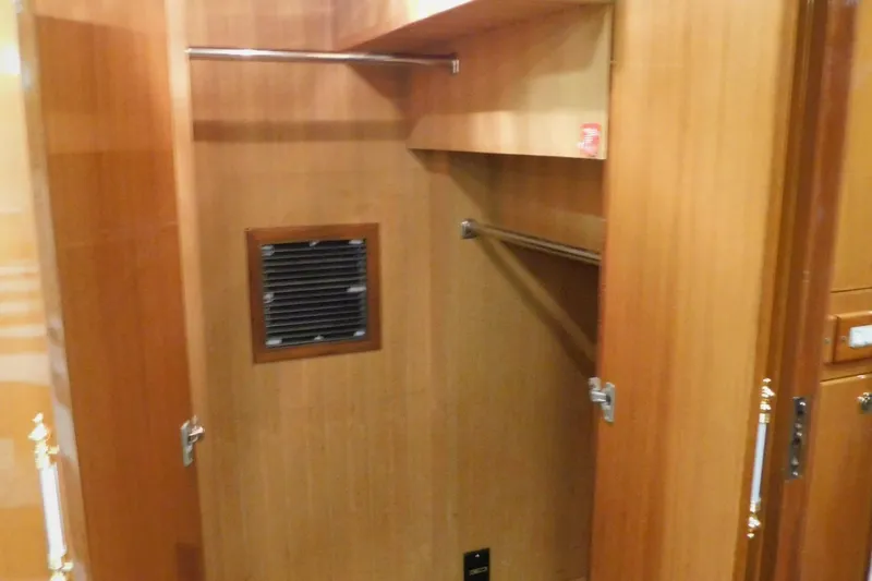 Liquid Gold Yacht Photos Pics Wooden closet interior on a 2001 Jefferson Pilothouse 57 yacht.