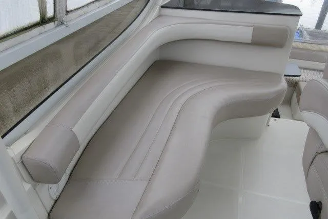  Yacht Photos Pics Luxurious seating area on a 2008 Carver 47 Motor Yacht, featuring elegant curved design.