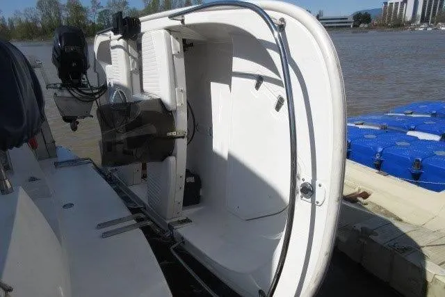  Yacht Photos Pics 2008 Carver 47 Motor Yacht stern view with open storage compartment.