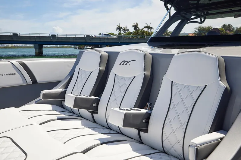 Devenzo Yacht Photos Pics Luxurious seating on 2022 Midnight Express 43 Open boat with elegant design and cup holders.