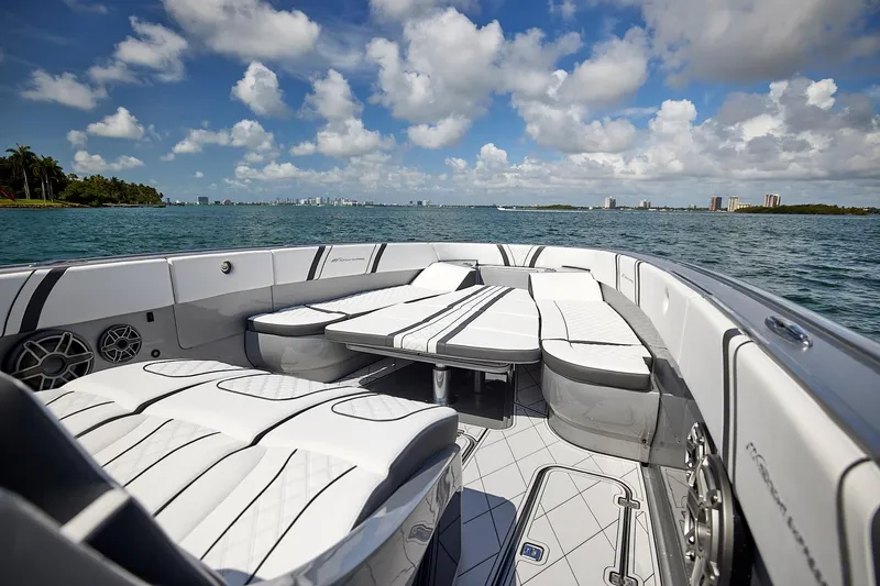Devenzo Yacht Photos Pics Luxurious 2022 Midnight Express 43 Open boat interior with plush seating on open water.