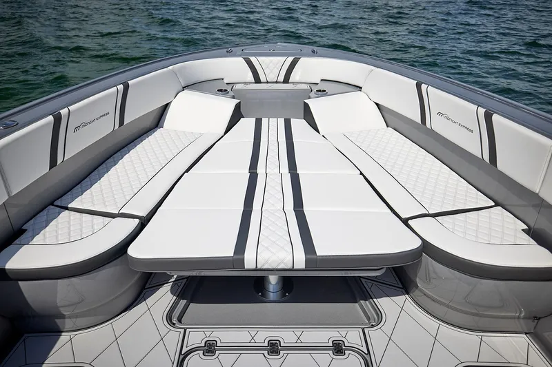Devenzo Yacht Photos Pics Luxurious seating on 2022 Midnight Express 43 Open boat, featuring elegant white and gray upholstery.