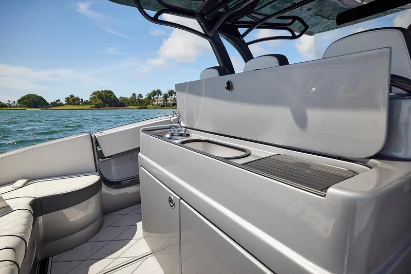 Devenzo Yacht Photos Pics 2022 Midnight Express 43 Open boat interior with sleek design and modern amenities.