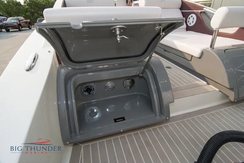  Yacht Photos Pics 2019 Donzi 41 GT boat with open storage compartment on deck.