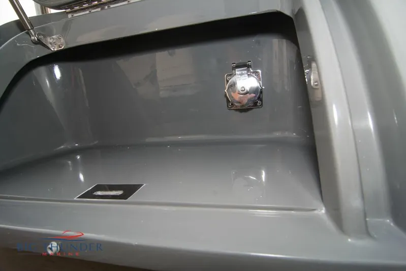  Yacht Photos Pics 2019 Donzi 41 GT storage compartment with sleek gray finish.