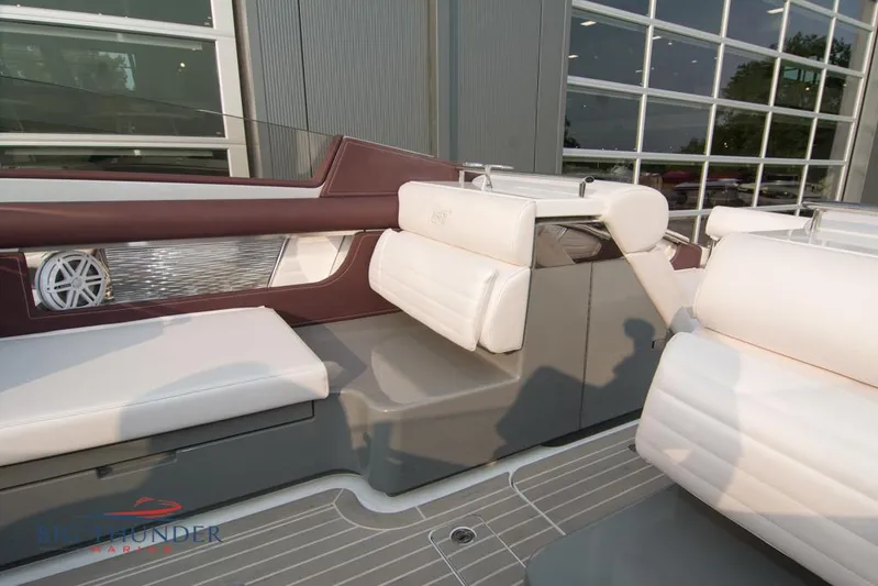  Yacht Photos Pics Interior seating of a 2019 Donzi 41 GT boat with white and maroon upholstery.