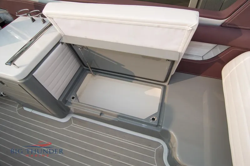  Yacht Photos Pics 2019 Donzi 41 GT boat interior storage compartment with white and gray seating.
