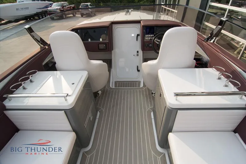  Yacht Photos Pics 2019 Donzi 41 GT boat interior with white seats and Big Thunder Marine logo.