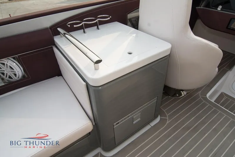  Yacht Photos Pics Interior of 2019 Donzi 41 GT boat with seating and storage.