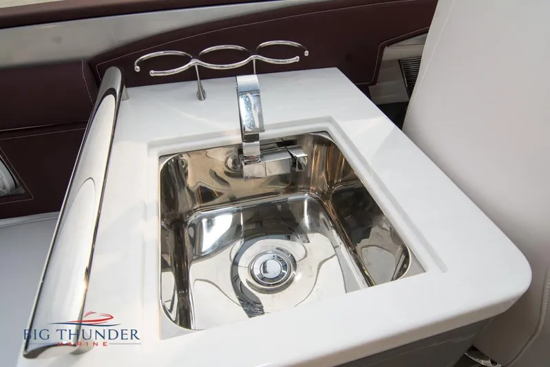  Yacht Photos Pics 2019 Donzi 41 GT boat sink with modern faucet and Big Thunder Marine logo.