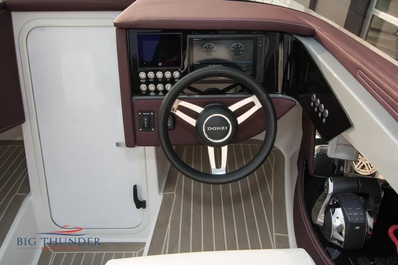  Yacht Photos Pics 2019 Donzi 41 GT boat steering wheel and dashboard with Big Thunder Marine logo.