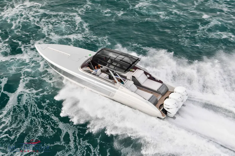  Yacht Photos Pics 2019 Donzi 41 GT speedboat cruising on open water.