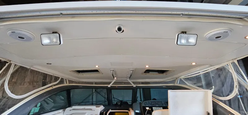 Sunbeam Yacht Photos Pics 2002 Pursuit 3800 Express boat interior with ceiling lights and dashboard view.