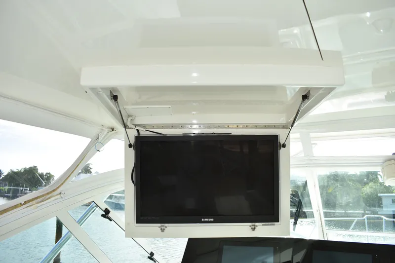 Kraken Yacht Photos Pics 2007 Cabo Express boat interior with mounted Samsung TV display.