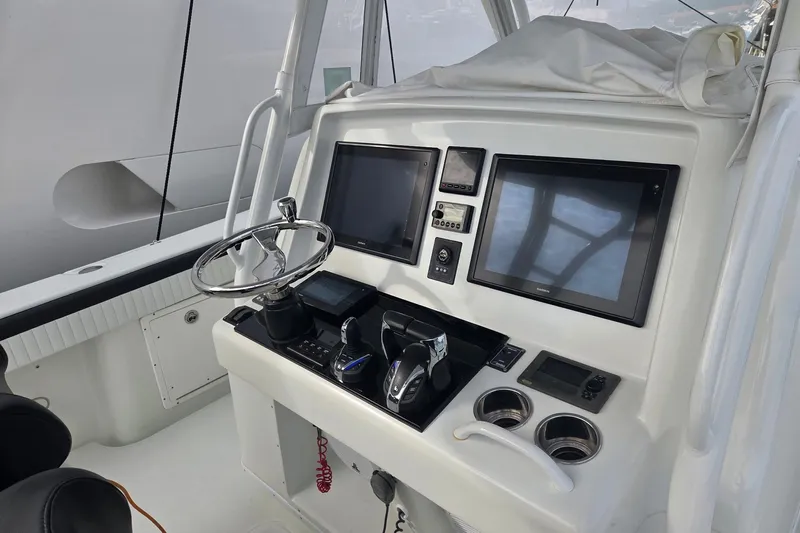  Yacht Photos Pics Helm of 2014 Yellowfin 39 Offshore boat with dual screens and controls.