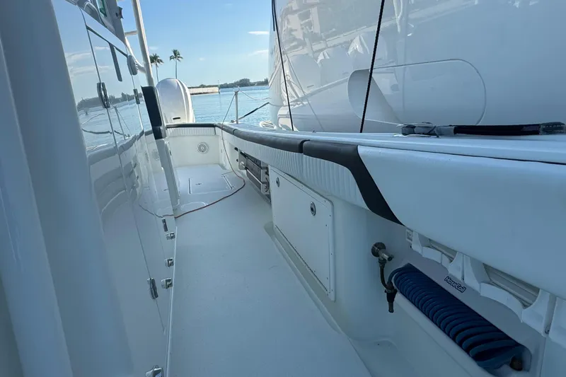  Yacht Photos Pics 2014 Yellowfin 39 Offshore boat deck with ocean view and palm trees.